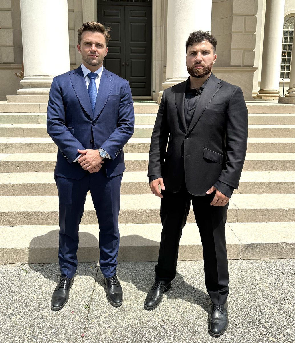 Two Muscular Men in Jackets